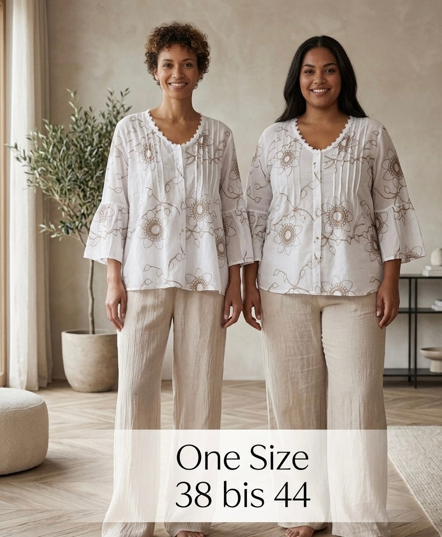 Romantische Eleganz:  neue Lieblingsbluse in A-Form mit floralen Akzenten und dezent-zartem Glitzer