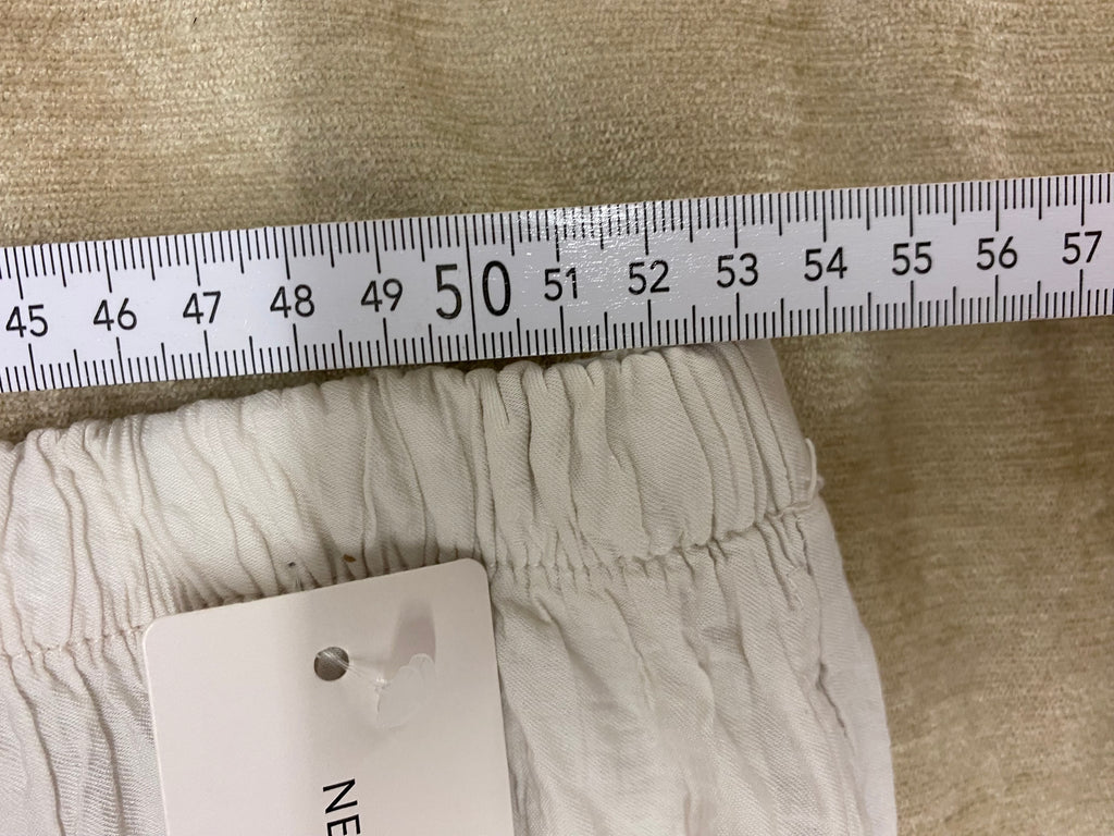 Sommerliche Palazzo-Hose in Off-White – Crinkle-Optik – One Size (Gr 38-44)