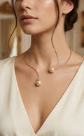 Zeitlose Eleganz trifft modernes Design mit Muschelkernperlen in einem abgetönten, zarten Weiß